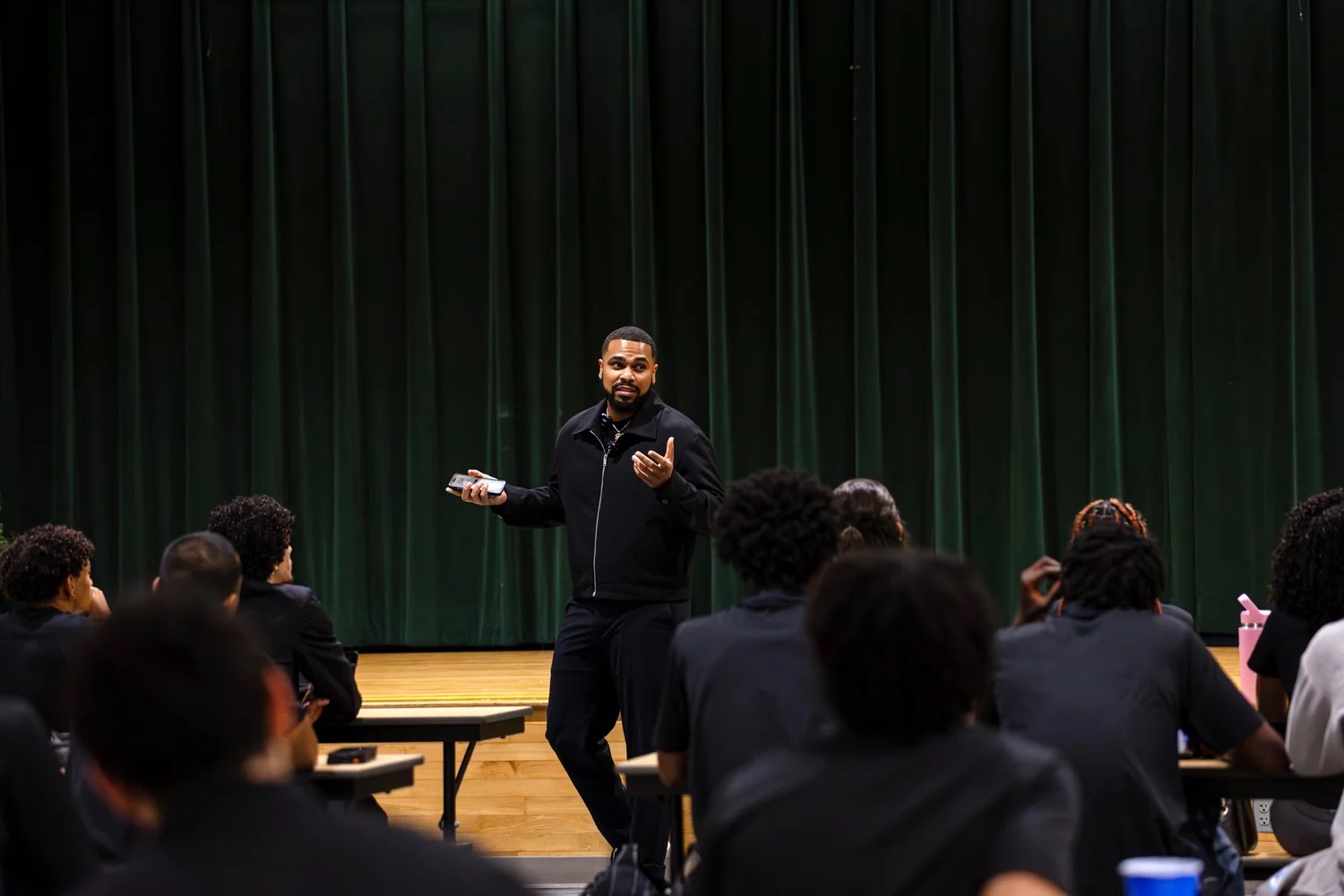 ESEF founder Shaquille Figueroa presenting to a room of students.